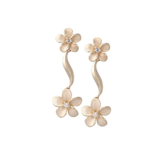 Plumeria-Ring aus 14 Kt. Gelbgold mit 3 Diamanten